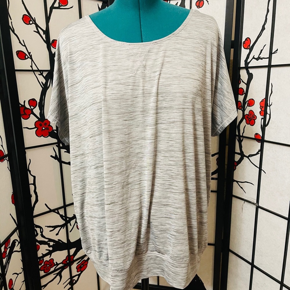 Grey activewear top with cut out back
